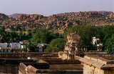 The Virupaksha Temple (also known as the Pampapathi Temple) is Hampi's main centre of pilgrimage. It is fully intact among the surrounding ruins and is still used in worship. The temple is dedicated to Lord Shiva, known here as Virupaksha, as the consort of the local goddess Pampa who is associated with the Tungabhadra River.<br/><br/>

Hampi is a village in northern Karnataka state. It is located within the ruins of Vijayanagara, the former capital of the Vijayanagara Empire. Predating the city of Vijayanagara, it continues to be an important religious centre, housing the Virupaksha Temple, as well as several other monuments belonging to the old city.