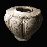 Jar with lotus, chrysanthemum motifs. Pattern brown glazed ceramic, Trần dynasty, 13th-14th century. Nam Định province, northern Vietnam. Domestic use. National Museum of Vietnamese History, Hanoi.