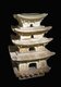 Stupa with lotus, bodhi leaf, dancer decoration. Ceramic, Lý dynasty, 11th-13th century, Hanoi. Object for worship. National Museum of Vietnamese History, Hanoi.